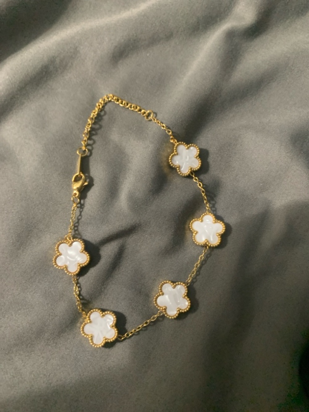 Gold Chain Bracelet with White Flower Motifs